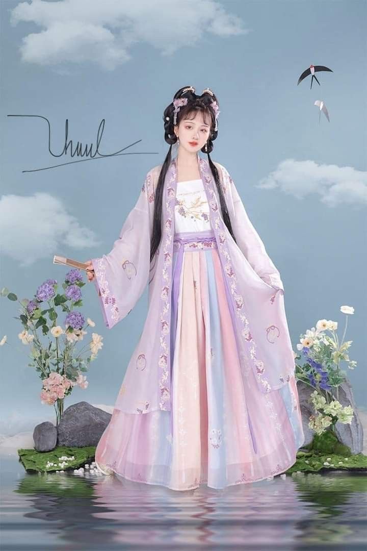 Reimagining Traditional Cheongsam Dress:The Evolution of Mid-Length Qipao Reimagining Traditional Cheongsam Dress:The Evolution of Mid-Length Qipao