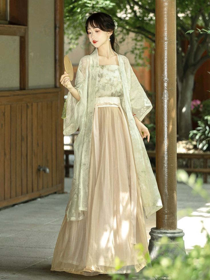 The Qipao and its Enchantment on Little Girls The Qipao and its Enchantment on Little Girls