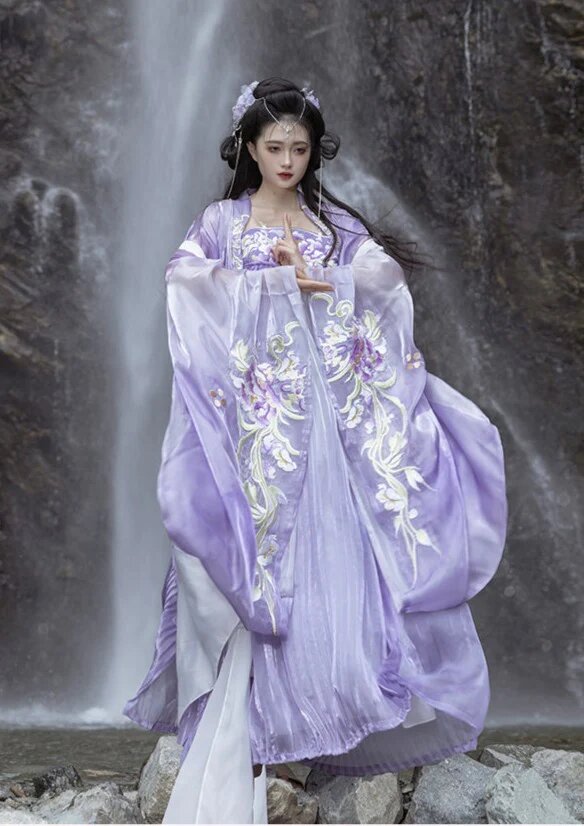 The Enchanting Journey of a Primary School Student in a Purple Hanfu Costume The Enchanting Journey of a Primary School Student in a Purple Hanfu Costume