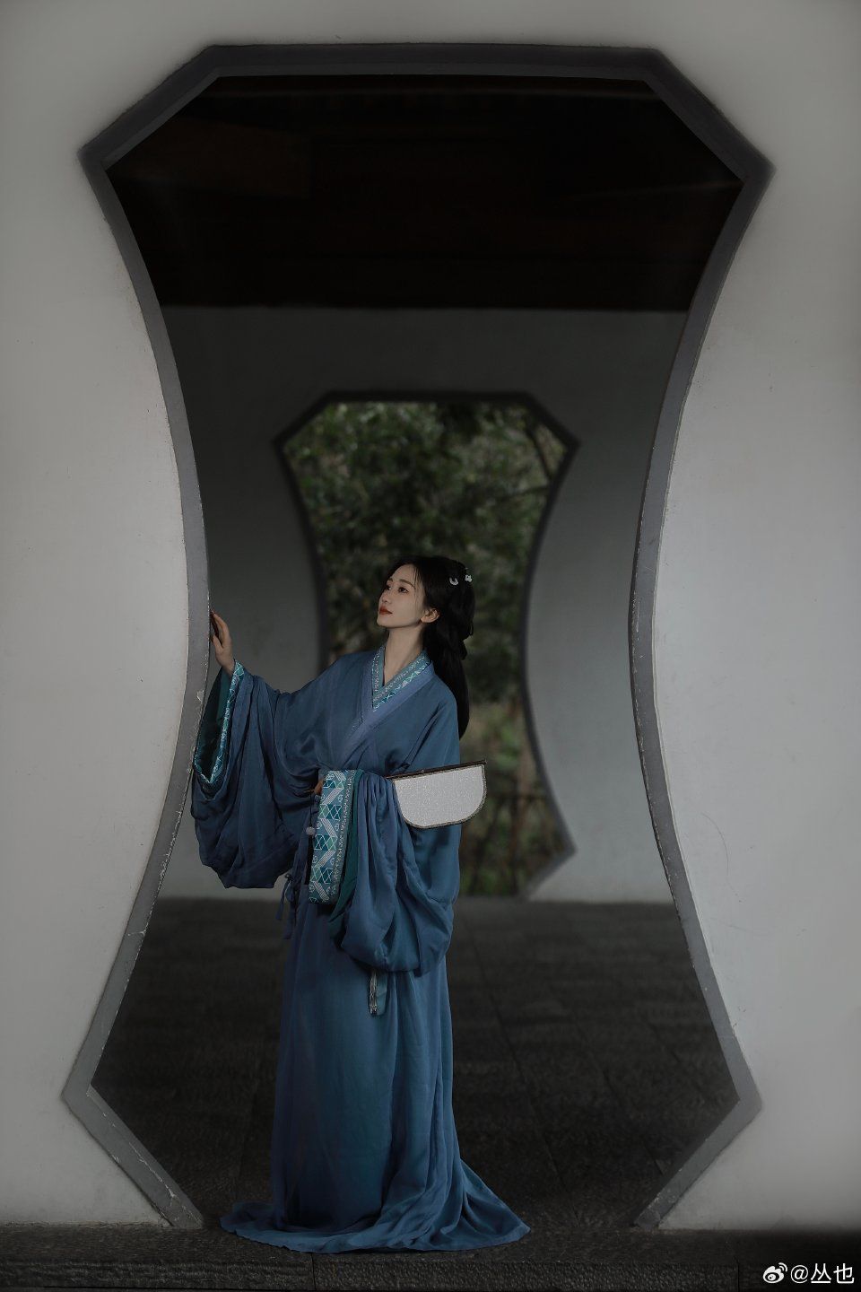 The Elegance of a Long Cheongsam Woman