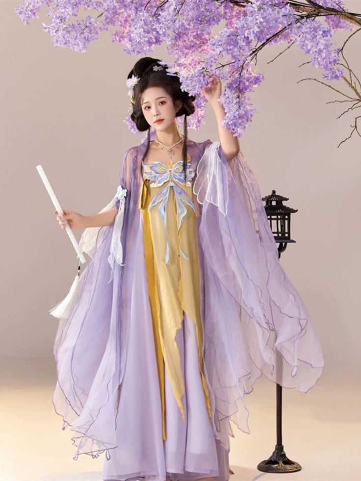 Chinese Girl in Traditional Tang and Hanfu Fashion Chinese Girl in Traditional Tang and Hanfu Fashion