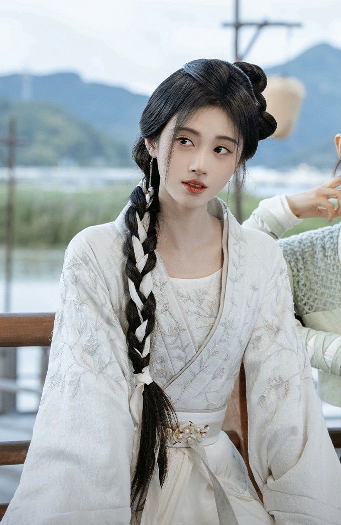 White Knitted Cheongsam:A Closer Look at Its Elegance and Cultural Significance White Knitted Cheongsam:A Closer Look at Its Elegance and Cultural Significance